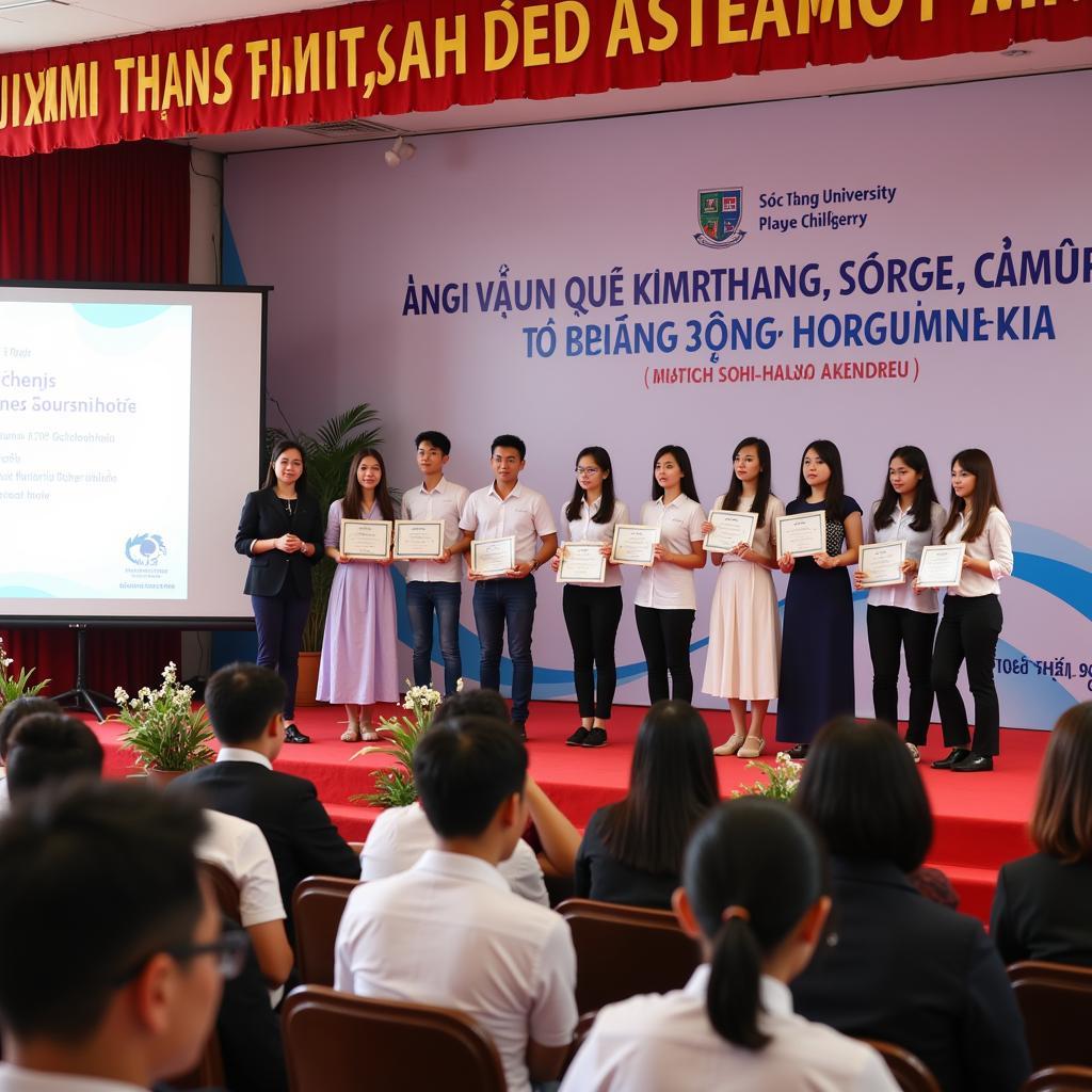 Hình ảnh buổi lễ trao học bổng cho sinh viên xuất sắc của trường Đại học Sóc Trăng.